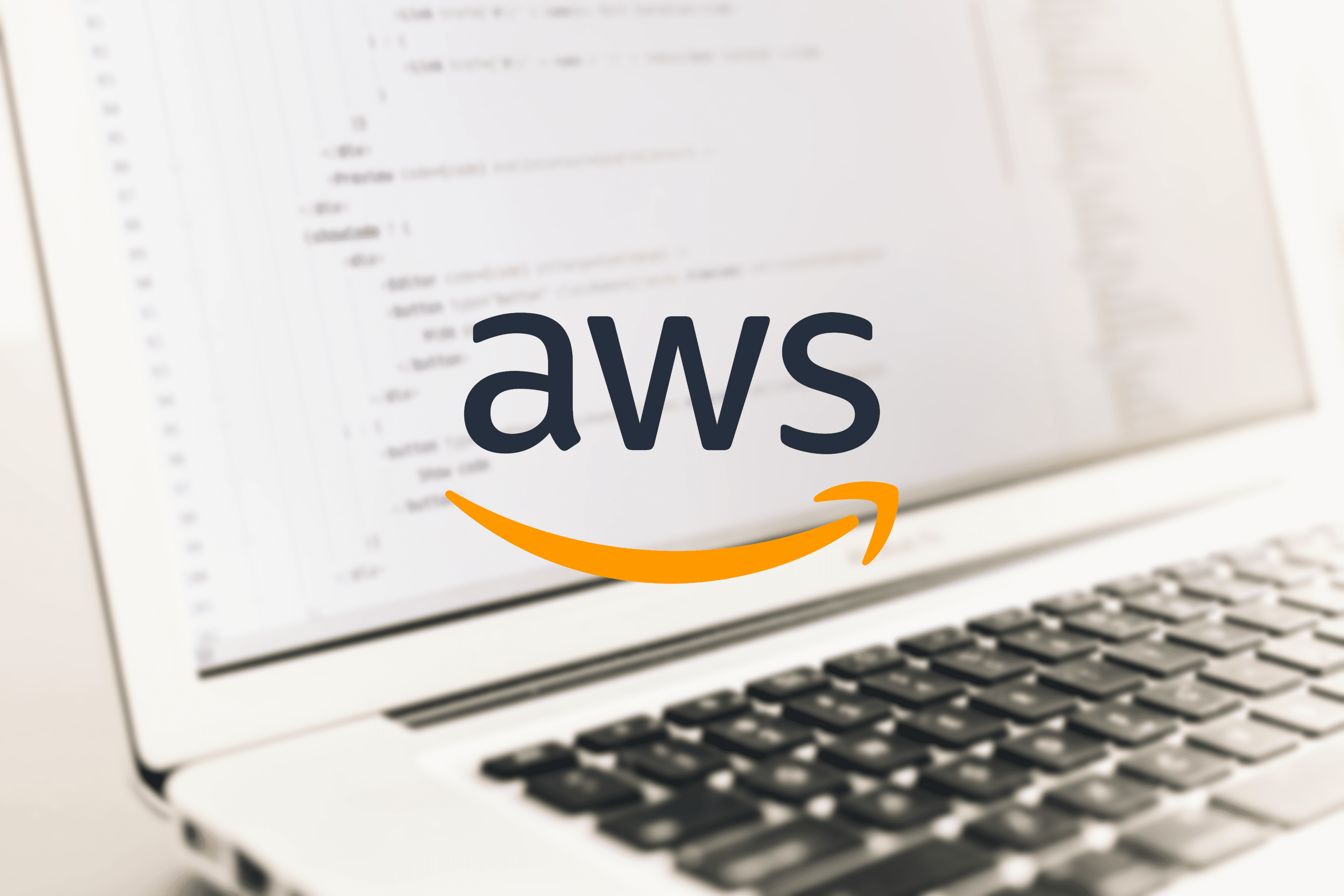 Code on laptop screen with AWS logo in the foreground