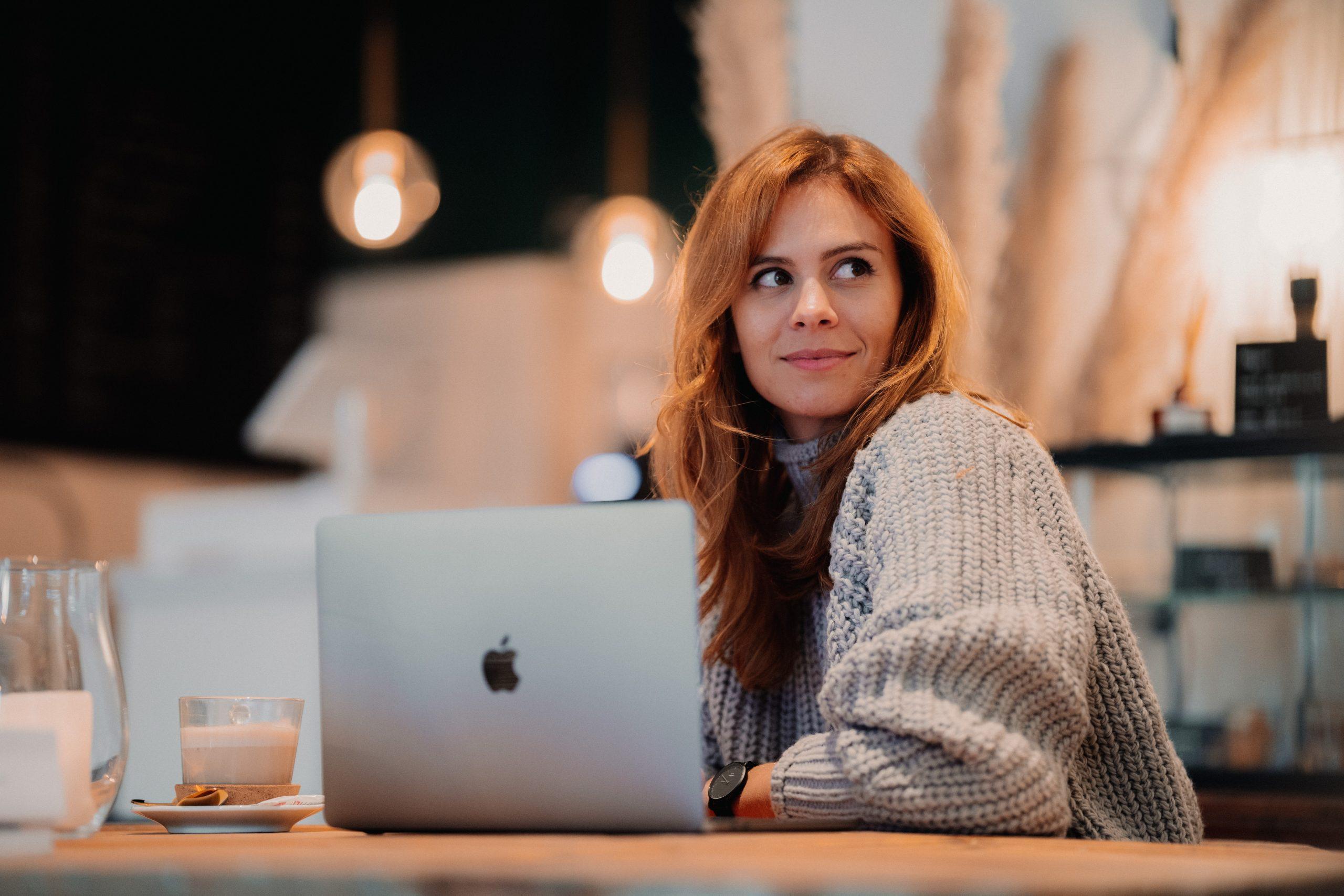 Woman with Apple laptop